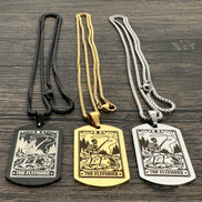 Three necklaces with 'The Flyfisher' pendant on a wooden surface