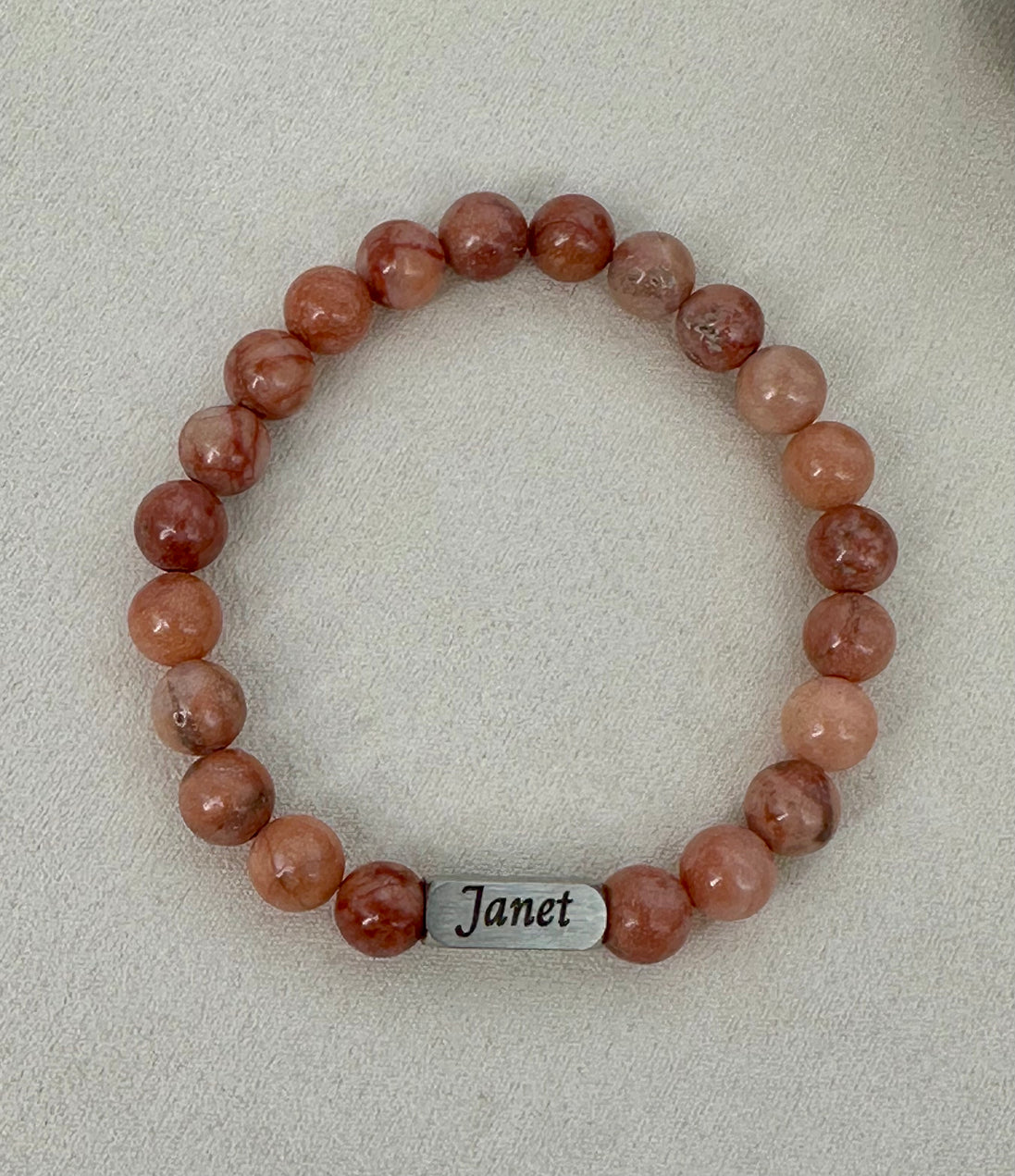 Laser engraved Beaded bracelet with a name engraved on a stainless steel bar