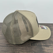 Side view of a beige fly fishing brook trout hat