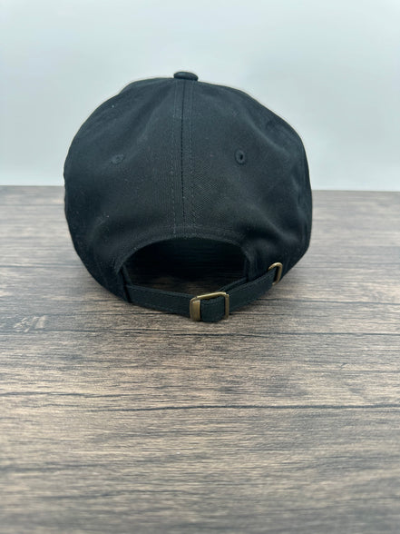 Back view of a Black hat with a red and black buffalo plaid patch that has mama bear engraved on the patch