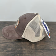 Side view of a Hat with Cow Print Cowgirl Patch