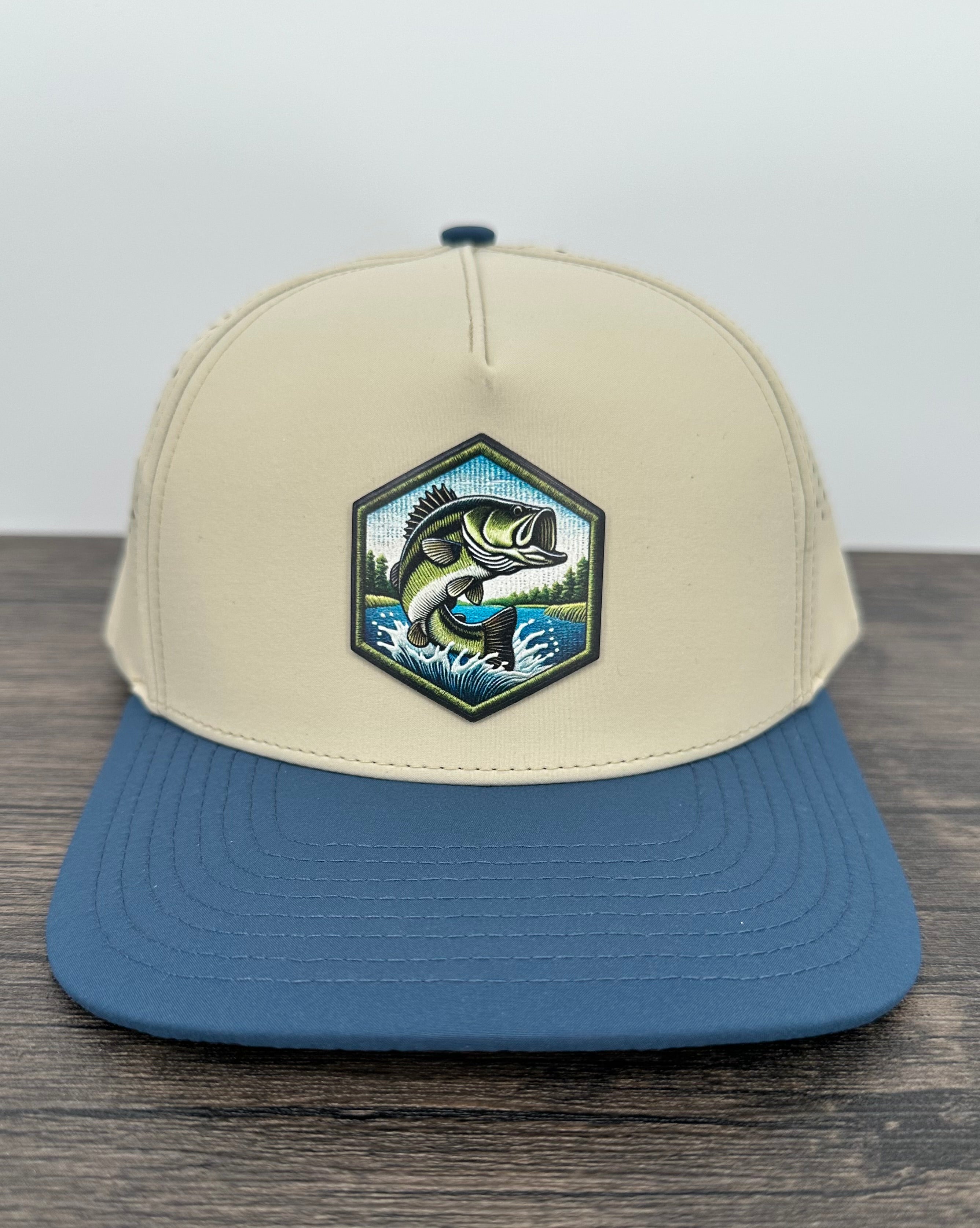 Beige and blue cap with a jumping bass fish patch 