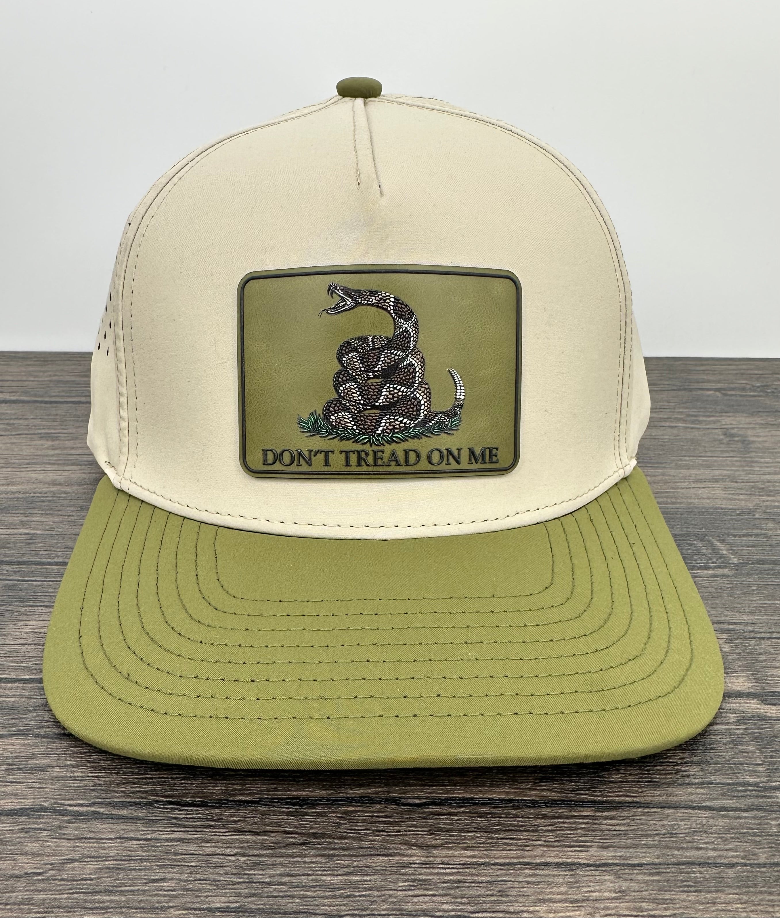 Beige and green cap with 'Don't Tread on Me' patch hat