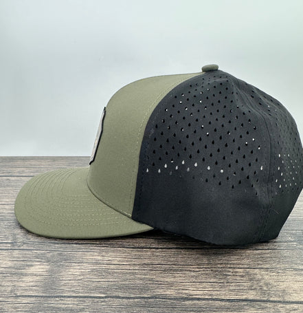 Side view of a green and black deer hunting hat