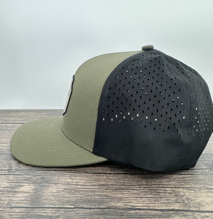 Side view of a green and black deer hunting hat