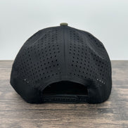 Back view of a green and brown deer hunting hat