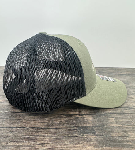 Side view of an embroidered fly fishing hat in green and black