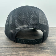 Back view of a green and black embroidered fly fishing hat