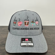 Charcoal gray and black Richardson 115 hat with coffee embroidery with Coffee makes me nicer embroidered on it
