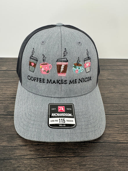 Gray cap with embroidered  coffee designs with coffee makes me nicer embroidered on it