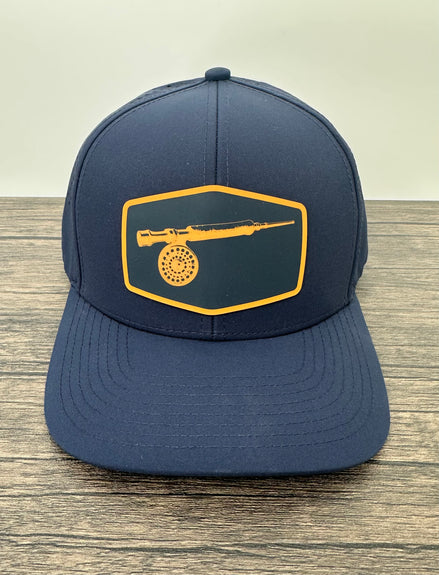 Navy Blue 6-panel hat with a fly fishing fly rod and reel patch