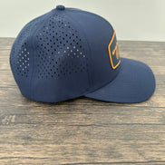 Side view of a fly fishing patch hat with a silicone patch with a fly fishing rod and reel