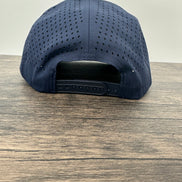 Back view of a navy blue fly  fishing hat that has a fly fishing rod and reel patch 