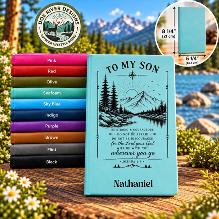 Personalized light blue hardcover journal with a black mountain and forest illustration and the text 'TO MY SON' and 'Nathaniel', shown in front of a stack of color options. A circular inset at top right shows the journal dimensions as 8 1/4 x 5 1/4 inches.
