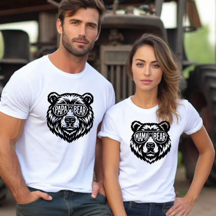 Man and woman wearing white t-shirts with mama bear and papa bear  graphics and text.