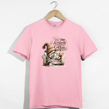 Pink t-shirt with a graphic of a gnome and text that says i’ll start working when my coffee does