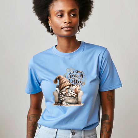 Blue shirt with gnome holding coffee and text that reads I’ll start working when my coffee does