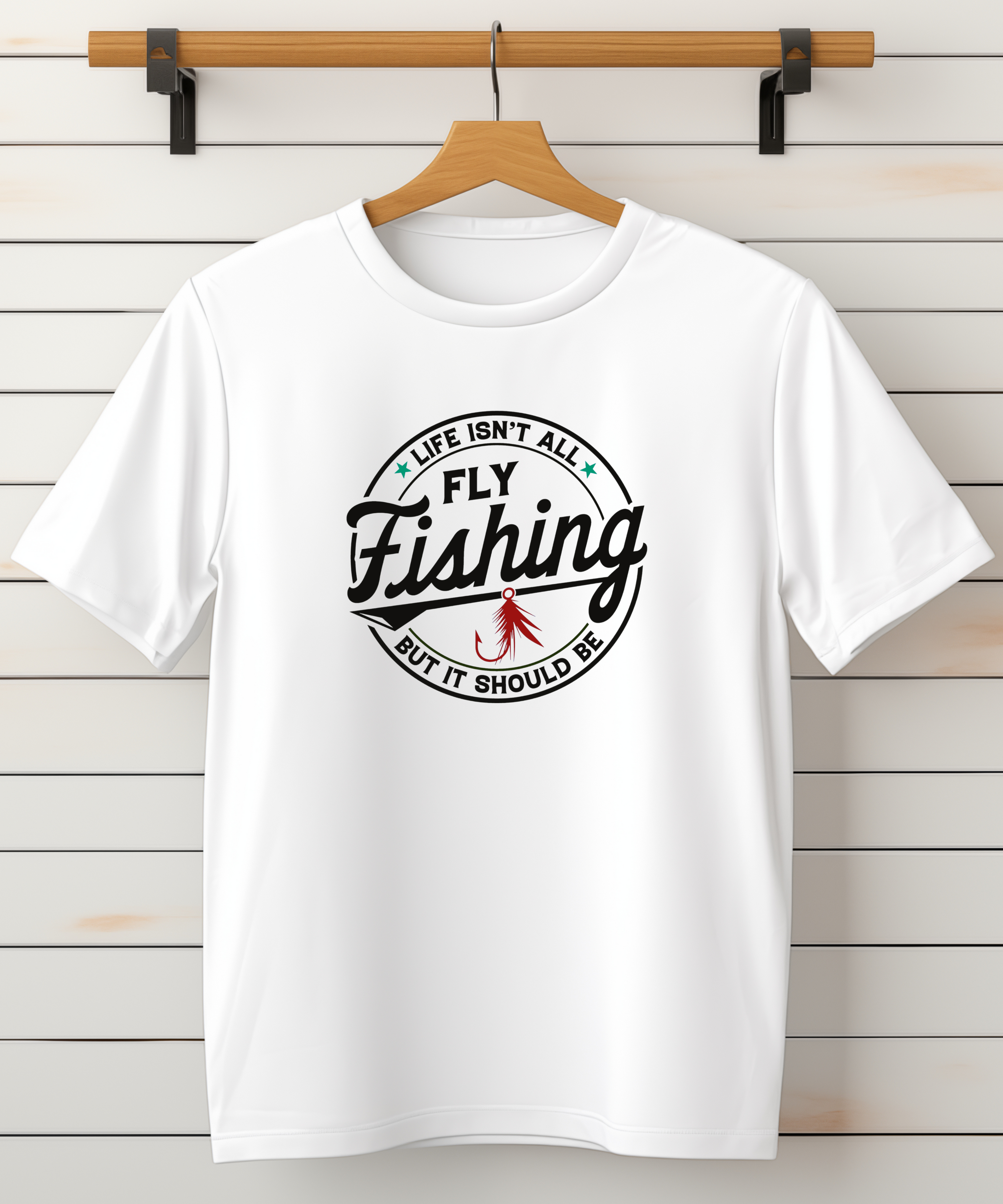 White shirt with the saying life isn’t all about fly fishing but it should be
