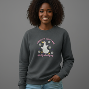 Black female model wearing charcoal gray sweatshirt with simple background