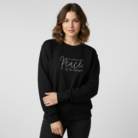 Female model wearing black sweatshirt with peace message