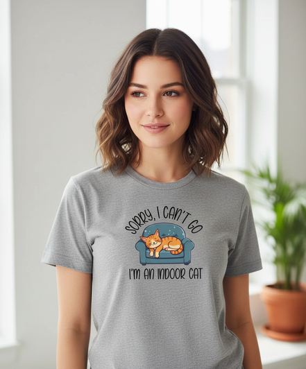Female model wearing Sorry I Can't Go shirt in sports grey