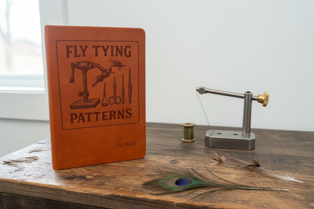 Fly Tying Patterns Journal on Rustic Desk