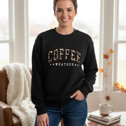Model wearing black Coffee Weather sweatshirt with cream stitching