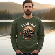 Model wearing military green fishing sweatshirt in lake setting