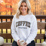 Model wearing white Coffee Weather sweatshirt
