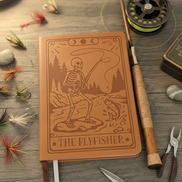 The Flyfisher Journal with brown and white ribbons